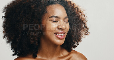 Buy stock photo Beauty, skincare and face of African happy woman in studio for wellness, cosmetics and facial treatment. Dermatology, spa and person with smile for health, salon and natural skin on white background