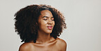 Smile, African woman or makeup for beauty, hair care or natural afro style for skincare or face cosmetics. White background, healthy glow or girl model in studio with banner, space and confidence