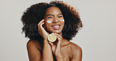 Buy stock photo Face cream, lemon or African woman with skincare, portrait or space for glow or natural lotion. Studio, moisturiser or model with fruit, smile or mockup for cosmetics or beauty by white background