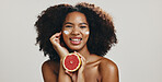 Grapefruit, face cream and portrait of African woman for skincare, natural detox and facial care. Dermatology, spa and person with fruit for wellness, organic cosmetics and beauty on white background