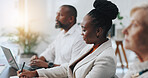 Meeting, group and woman with notes, business and listening to seminar in boardroom or colleagues. Audience, employees and training in corporate company, planning or presentation for people in office