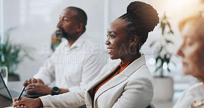 Buy stock photo Happy, business woman and listening in meeting with notes for budget review, financial insight and sales feedback. Finance, teamwork and employees with presentation for project funding information