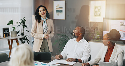 Buy stock photo Meeting, speaker and group with notes, boardroom and listening to ideas in business or colleagues. Office, strategy analyst and woman with speech for coworkers, smile and planning for market trends