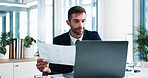 Happy, businessman or documents with laptop for finance or corporate performance at office desk. Man, accountant or analyst with paper, graph or chart for financial report, analysis or company budget