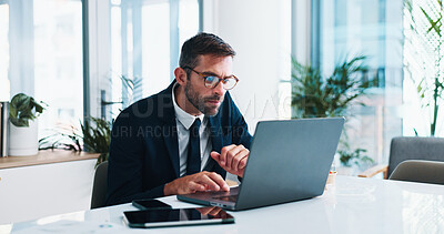 Buy stock photo Serious, businessman and research with laptop or corporate network, communication or email at office. Man, employee or accountant with computer for financial expenses or company assets at workplace