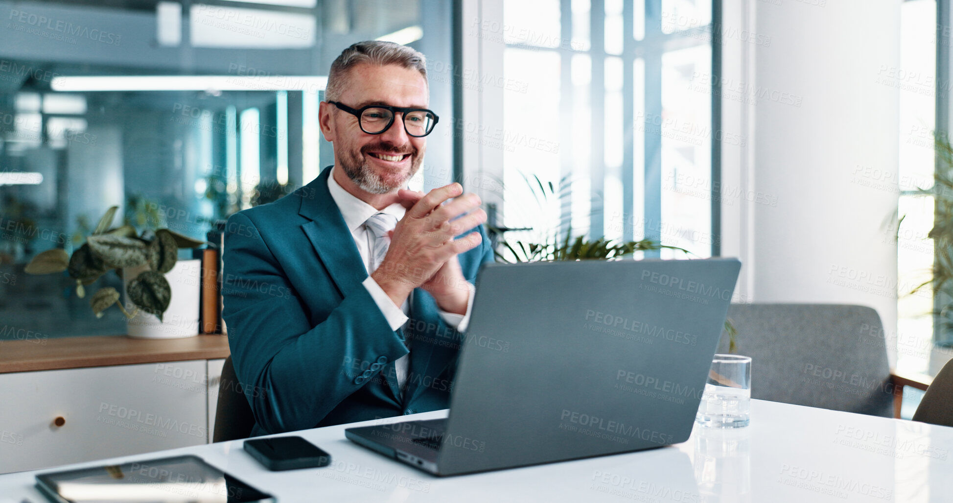 Buy stock photo Office, businessman and clap with laptop for video call, investment growth and finance achievement. Happy, mature person and financial advisor with virtual meeting for applause or celebrate promotion
