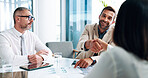 Meeting, handshake and business people in office with planning for company investment. Discussion, paperwork and team of financial advisors with profit, revenue or dividend chart for finance proposal