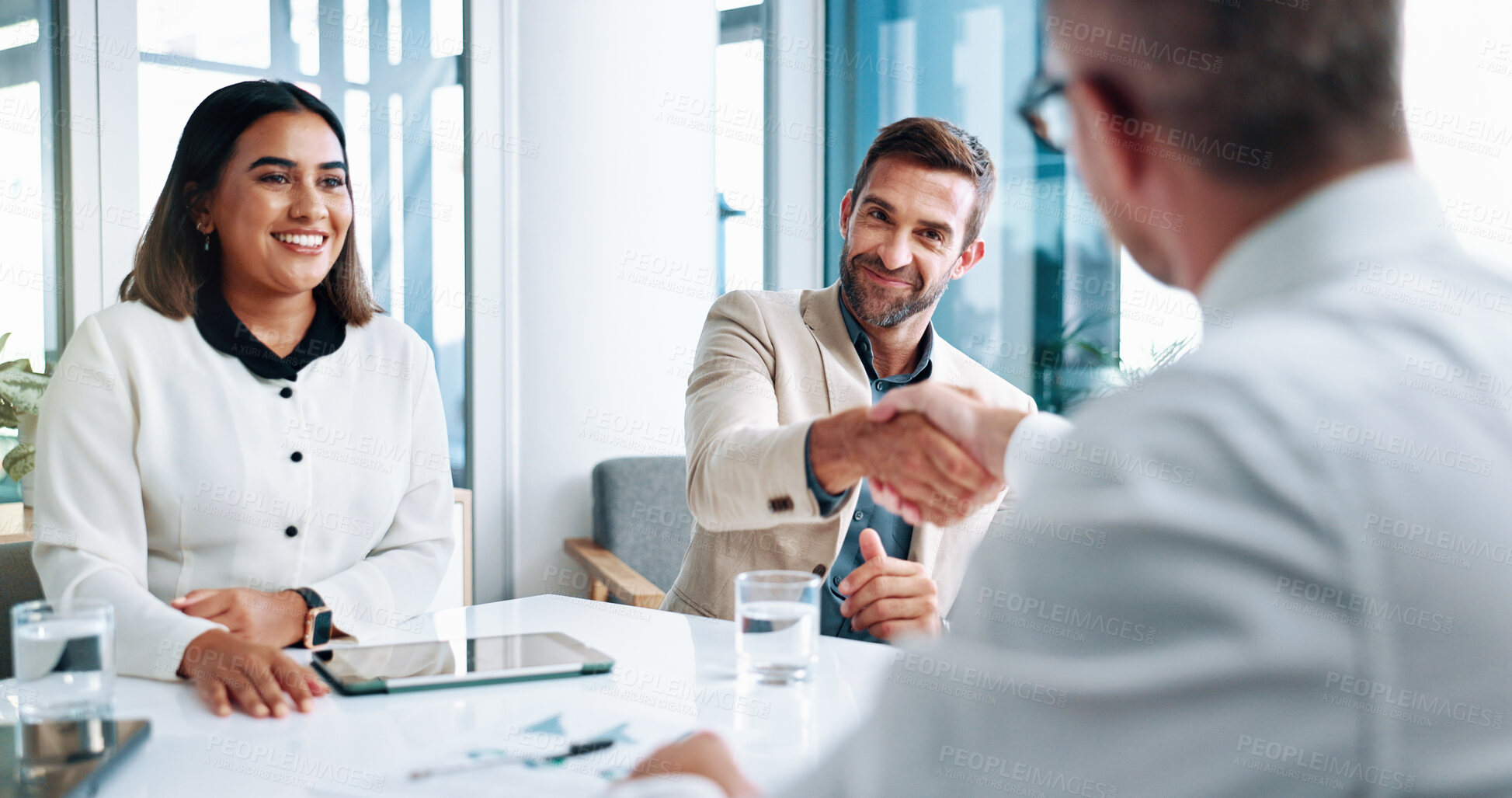 Buy stock photo Business, people and meeting with handshake in office for welcome, partnership and financial agreement. Staff, thank you and documents for investment deal, proposal negotiation and b2b of opportunity