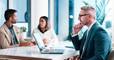Buy stock photo Meeting, businessman and thinking with laptop in office, financial report or review for corporate firm. Career, mature person and accountant with tech for investment research, reading or idea for faq