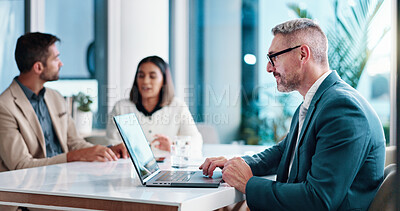 Buy stock photo Economist, meeting or businessman on laptop in office for feedback, financial planning and company. People, discussion and finance advisor for revenue growth, investment report and corporate review