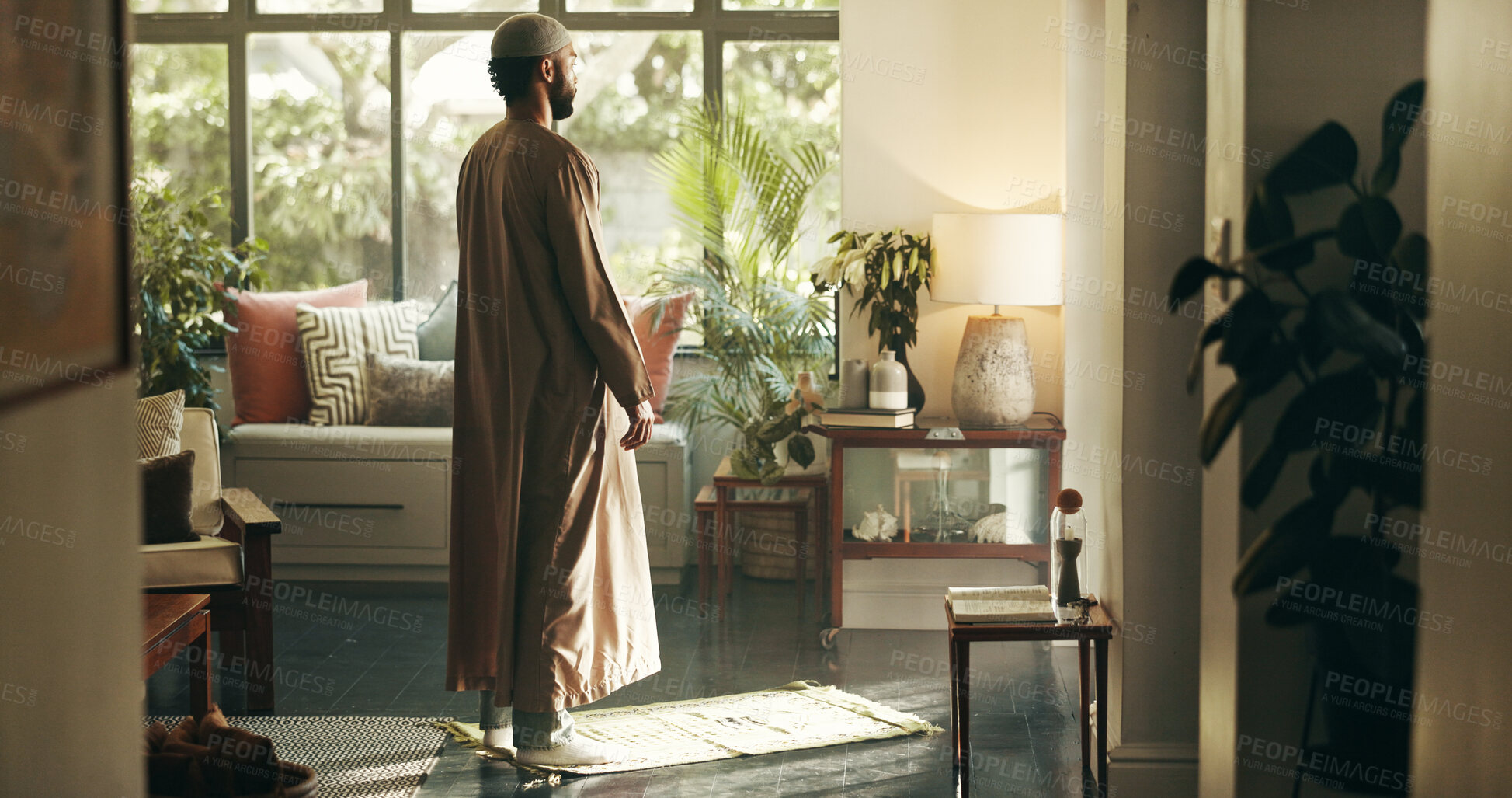 Buy stock photo Islamic, man and praying with belief at house of spiritual worship, praise Allah and faith in Ramadan. Muslim person, religion and dua in salah, reflection and mindfulness of fasting tradition of God