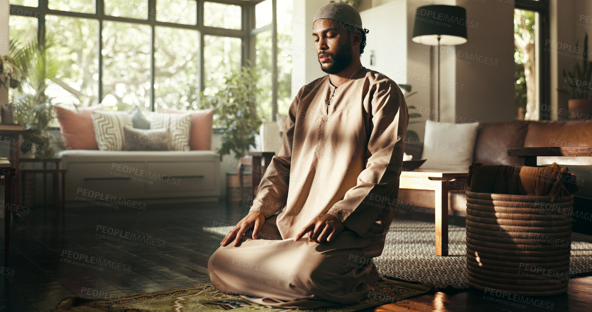 Buy stock photo Islam, worship and spiritual with man on home for ramadan kareem, religion or prayer. Floor, faith and eid Mubarak with Muslim person and salah in living room for gratitude, Allah or tahiyat pointing