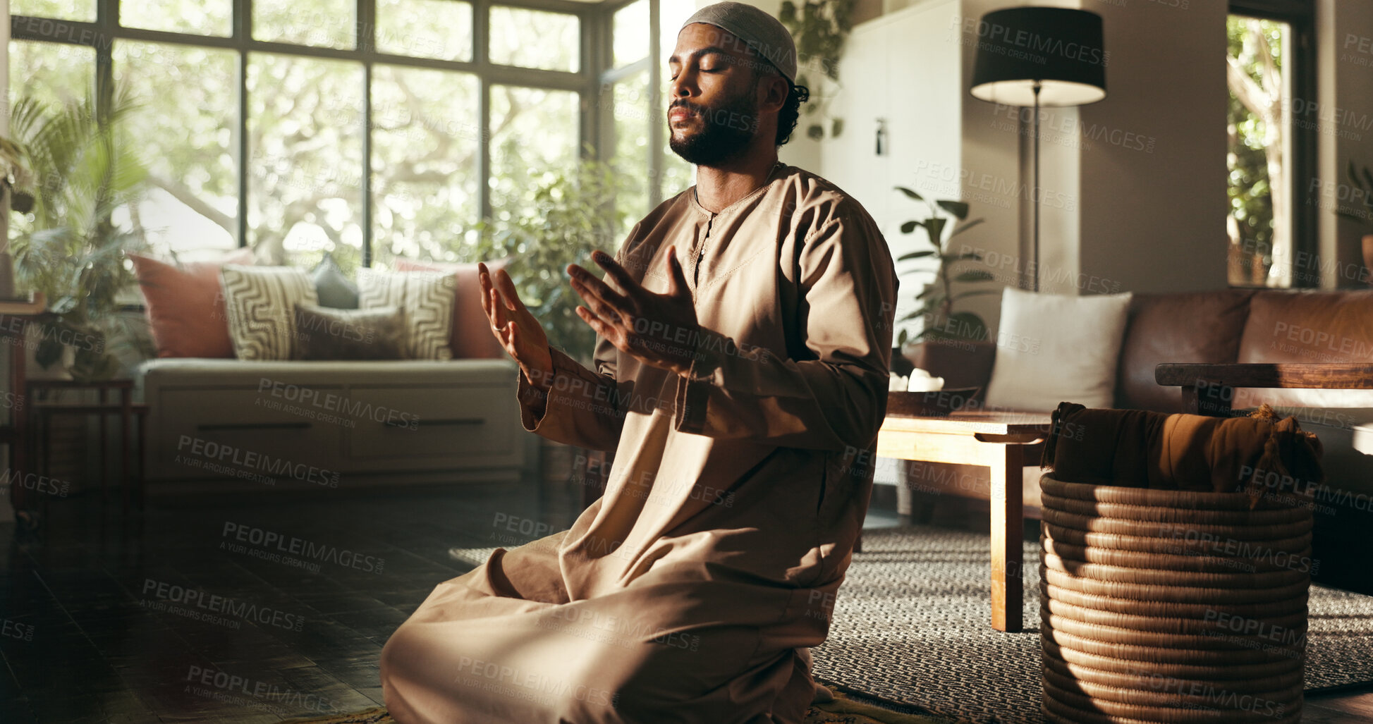 Buy stock photo Muslim, worship and dua with man in home for ramadan kareem, spiritual and prayer. Floor, faith and eid Mubarak with Islamic person and salah in living room for gratitude, Allah praise and religion