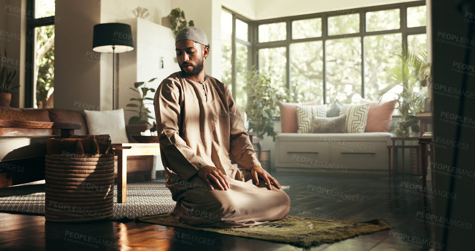 Buy stock photo Muslim, worship and peace with man in home for ramadan kareem, spiritual and prayer. Floor, faith and eid Mubarak with Islamic person and salah in living room for gratitude, Allah praise or salaam