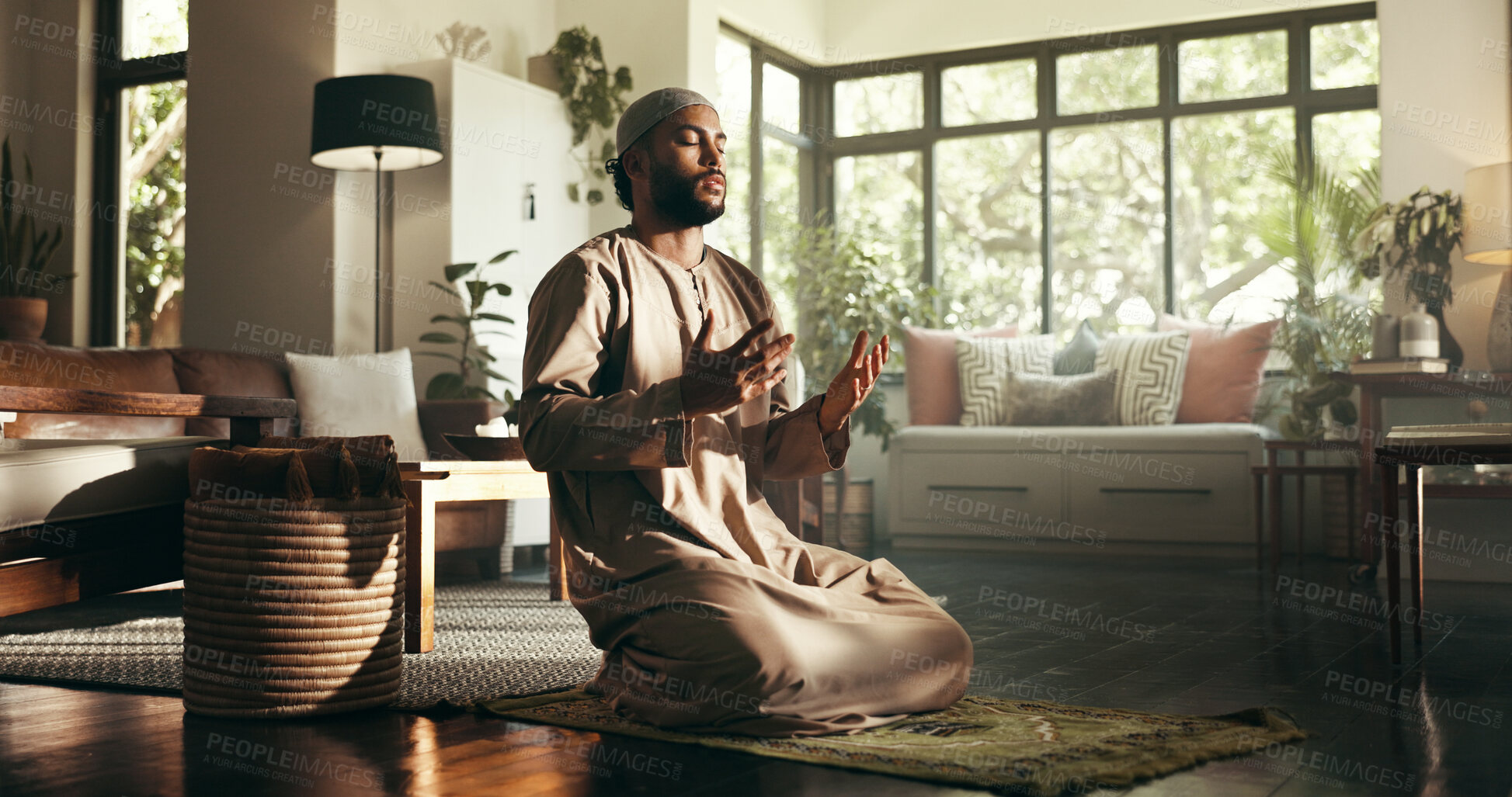 Buy stock photo Muslim man, prayer and mat in home with worship for ramadan, Islam or relationship with Allah. Person, hijab and morning for faith, religion and blessing with God for fasting, dua and praise in house
