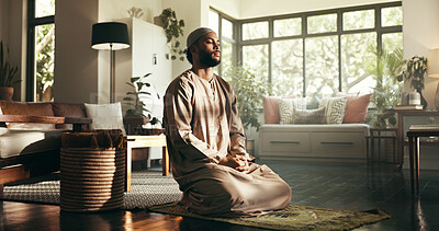 Buy stock photo Man, Islamic religion and mat in home with worship for ramadan, Muslim or relationship with Allah. Person, morning and pray for guide, faith and blessing with God for fasting, dua and praise in house