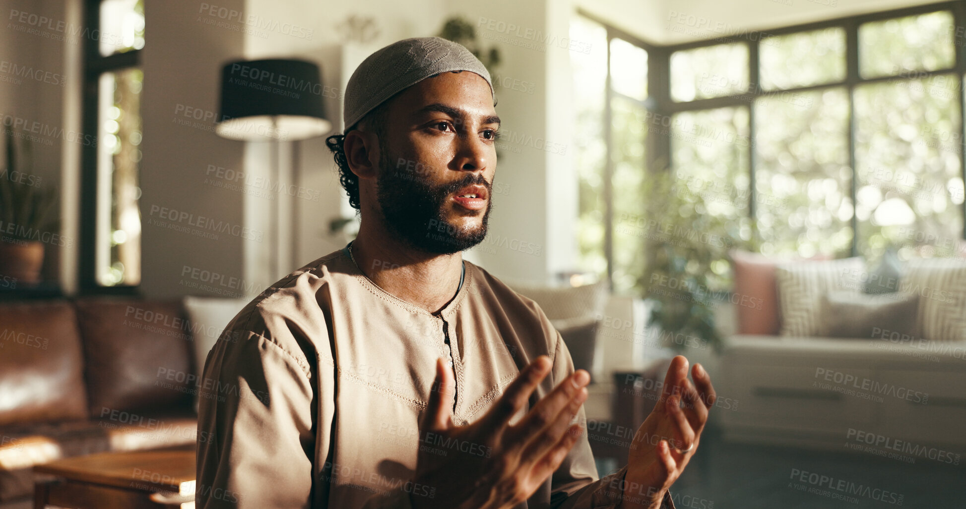 Buy stock photo Islamic, religion and man with prayer in home for spiritual worship, holy reflection or fasting meditation on floor. Muslim faith, person or dua in living room for gratitude, salah or praise to Allah