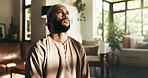 Islam, prayer and hope with man at home for ramadan kareem, spiritual and worship. Religion, faith and eid Mubarak with Muslim person and salah in living room for holy month, Allah praise and dua