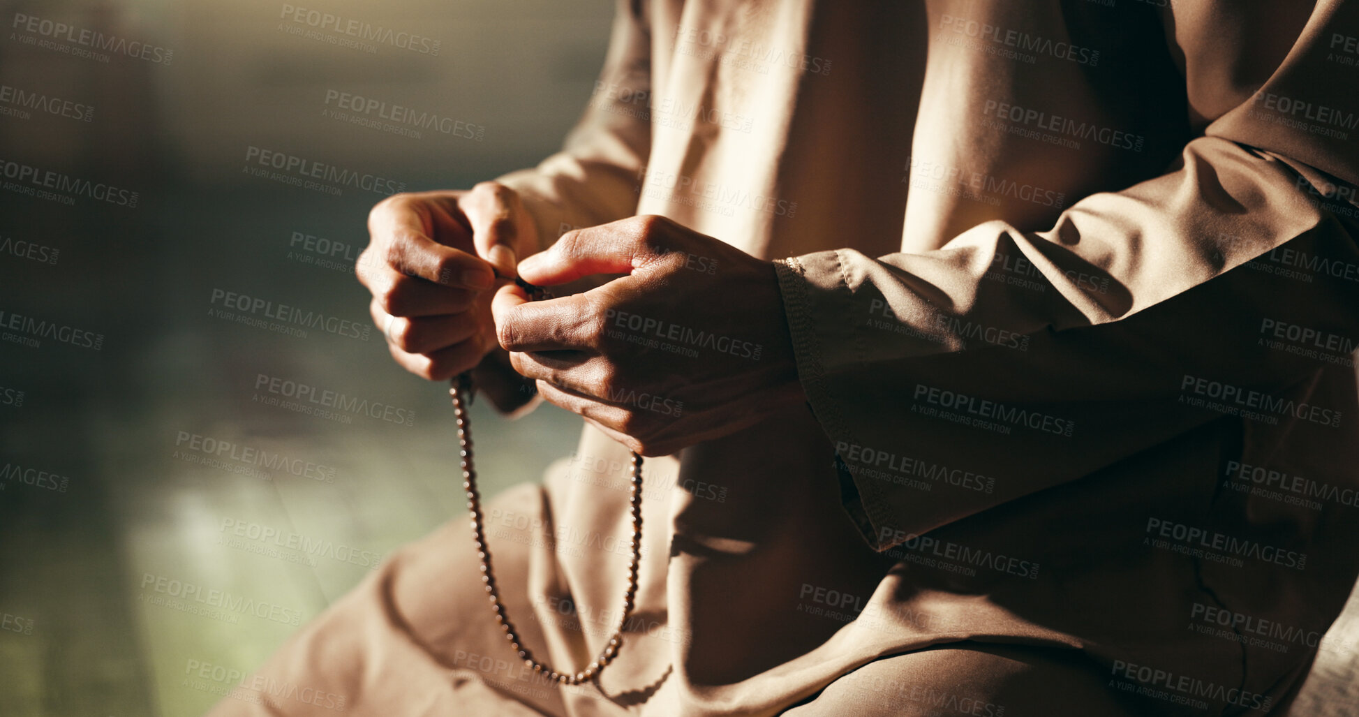 Buy stock photo Hands, Islam and prayer beads in home for religion on floor for relationship with Allah in morning. Muslim person, worship and faith with trust in God for fasting, dua or reflection at apartment