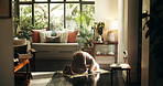 Muslim woman, praying and mat in home, Islam or kneeling for relationship with Allah in morning. Person, hijab and back for Ramadan, religion and trust in God for fasting, dua or reflection at house
