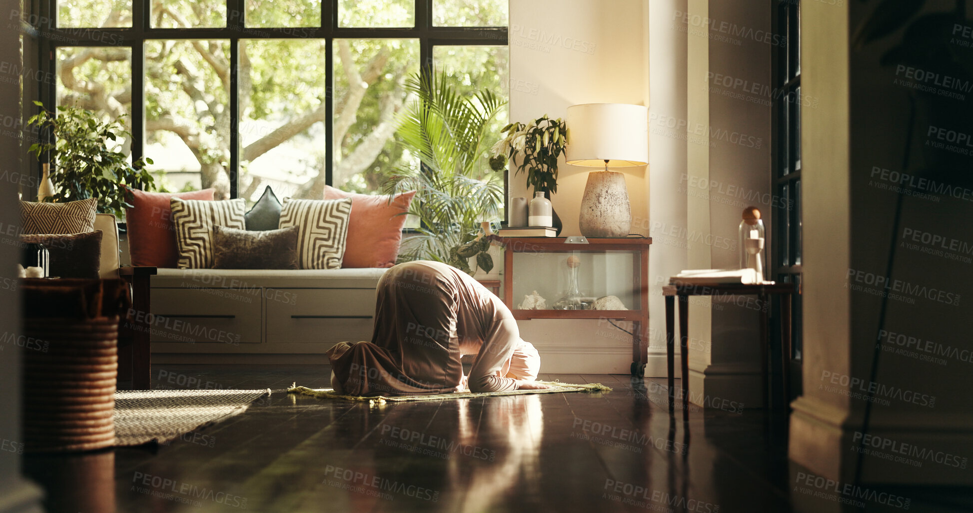 Buy stock photo Muslim, prayer and spiritual with woman on floor for gratitude, ramadan kareem and religion. Worship, peace and Islamic with person and bow in living room of home for eid Mubarak, Allah and faith