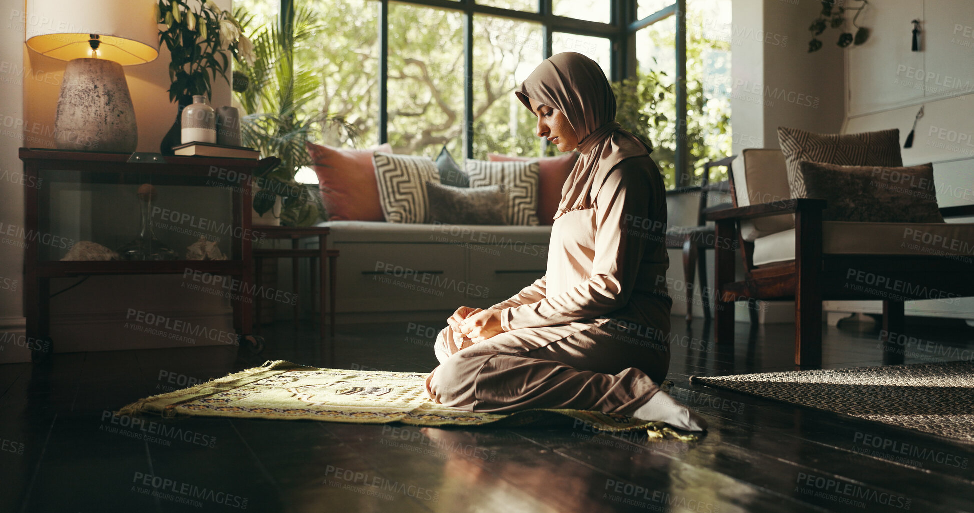 Buy stock photo Muslim woman, prayer mat and faith in home, Islam and start morning with worship for Allah in living room. Person, hijab and Ramadan on floor to praise God with fasting, dua and profile at apartment
