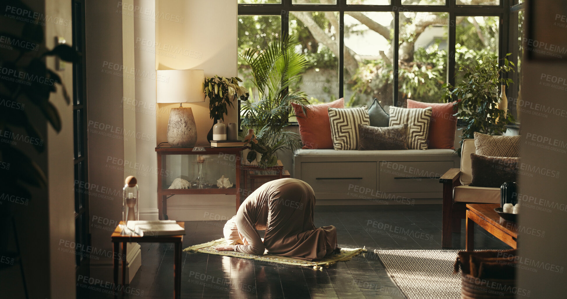 Buy stock photo Muslim, prayer and worship with woman on floor for gratitude, ramadan kareem and religion. Spiritual, peace and Islamic with person and dua in living room of home for eid Mubarak, Allah and faith