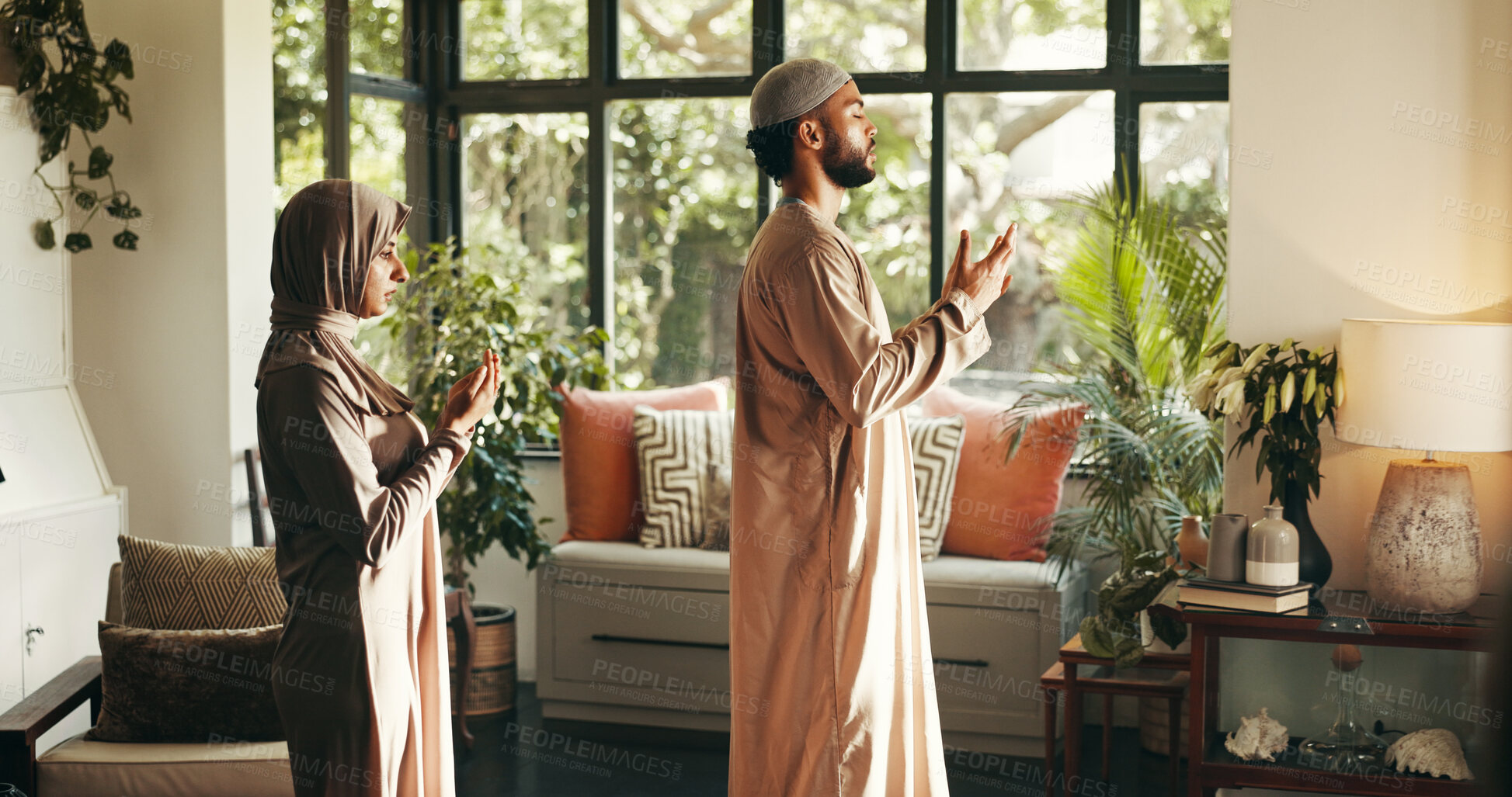 Buy stock photo Muslim, couple and pray with faith at house of spiritual worship, religion belief and praise to Allah. People, guidance and fasting for Ramadan tradition, holy devotion and gratitude of Islam culture