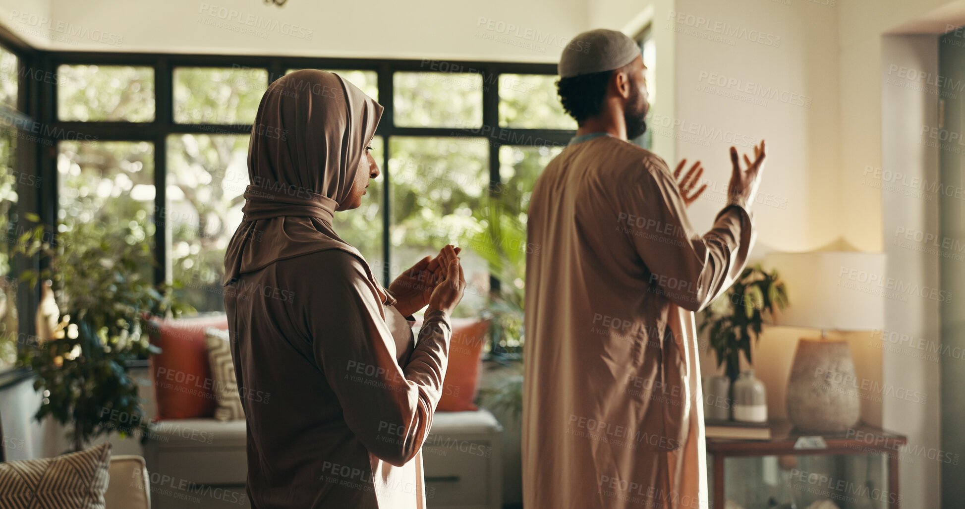 Buy stock photo Muslim, couple and prayer for religion at home of spiritual worship, Islamic belief and praise to Allah. People, faith or reflection of Eid Mubarak, holy devotion and gratitude of marriage commitment