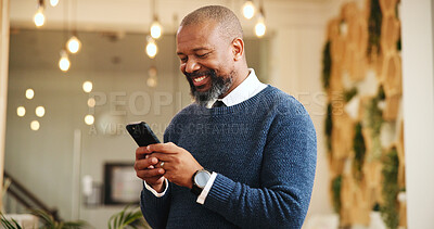 Buy stock photo Happy, black man and chatting with phone for social media, communication or chat at hotel. Mature person, user or smile with mobile smartphone for online texting, check in or schedule list at resort