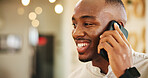 Happy, black man and phone call with conversation at hotel for stay, check in or friendly discussion. Male person, customer or user with smile on mobile smartphone for talk, chatting or app at resort