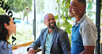 Buy stock photo Happy, waiter and couple in coffee shop for order for latte in morning for wake up, reunion or connection. Smile, barista and server with customers in cafeteria for checkup with hospitality service.