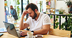 Sad, laptop and freelancer with man in cafe for journalist, remote worker and research stress. Planning, editor rejection and fail with male person in coffee shop for writes block and update