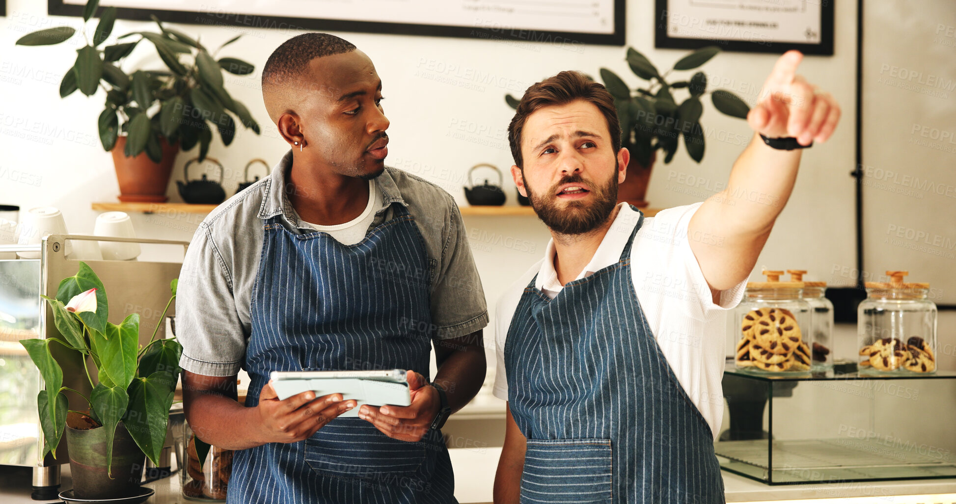 Buy stock photo Pointing, men and baristas planning in cafe for grand opening with startup, restaurant or business. Teamwork, tablet and male waiters with online stock order for coffee shop with technology together.