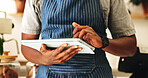 Man, hands and waiter with tablet in cafe for planning menu, online order and schedule in startup. Technology, small business and barista in coffee shop for stock, check inventory and communication