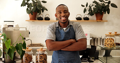 Buy stock photo Portrait, confident barista and black man in cafe for hospitality service, pride and welcome to startup. Smile, arms crossed and waiter in coffee shop, small business worker and professional in Kenya