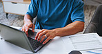 Person, hands and typing with laptop or documents for financial planning, budget report or invoices. Closeup, accountant or investments with computer or paperwork for schedule payments or tax list