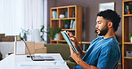 Businessman, tablet and laptop with logistics for inventory checklist or small business distribution. Man, distributor or technology with boxes for schedule delivery, supply chain or shipping at home