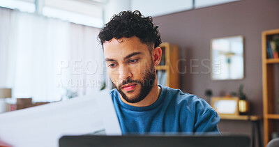 Buy stock photo Businessman, laptop and checking with documents for finance, budget or bills at home. Man, freelancer or user with paperwork, invoices or payments for financial costs, mortgage or rent at house