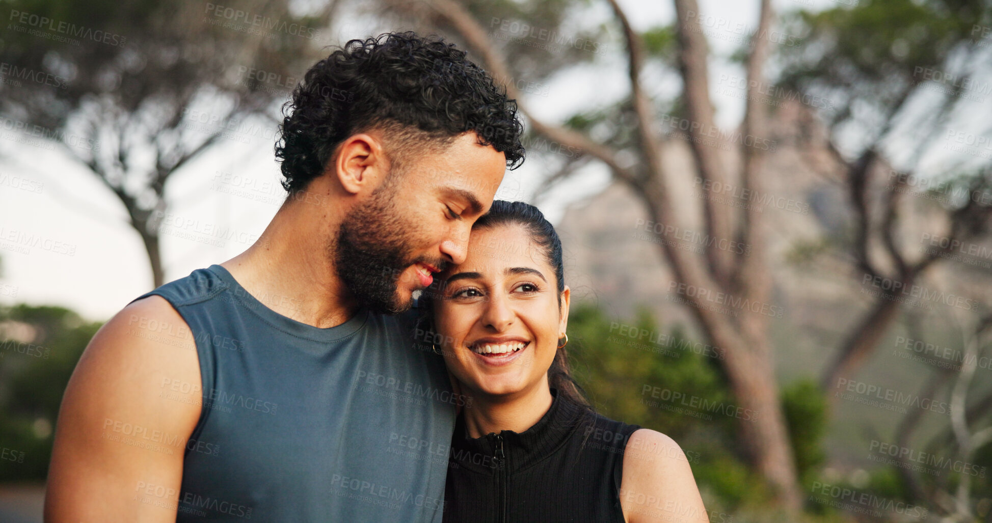 Buy stock photo Exercise, hug and smile with couple outdoor together for cardio, health or sports training. Bonding, fitness or love with man and woman embracing in forest for challenge, performance or workout