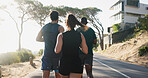 Fitness, group and running with mountain road for workout, exercise or outdoor training together. Back view, team or active friends with jog on street for sprint, race or marathon on asphalt path