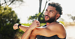 Man, fitness and stretching with arm in nature for workout preparation, exercise or outdoor training. Active, male person or thinking with warm up for sprint, challenge or race on mountain trail