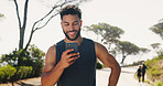 Outdoor, athlete and man with smartphone, fitness and planning for workout on app, happy and nature. Browsing, online and tracking performance on website, digital and runner with mobile for exercise