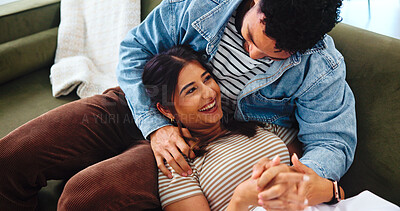 Buy stock photo Happy couple, relax and laughing with sofa for funny joke, bonding or humor together at home. Woman, man and care with love, comedy or weekend with smile for holiday, comfort or romance at house