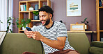 Phone, networking and man on sofa in home with typing for social connection on mobile app. Happy, relax and male person with cellphone for texting on media with online dating in living room at house 
