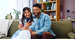 Couple, phone and social media on sofa with hug, bonding and funny story in home. Woman, man and smartphone in living room for storytelling, comedy and celebrity news on timeline with internet gossip