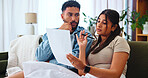 Couple, document and budget planning in home, mortgage expenses or insurance application. Living room, man and woman with paper for financial discussion, taxes or bills for asset management with debt