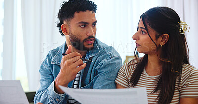 Buy stock photo Documents, talking and couple on sofa in home for bills, payment receipts and banking. Marriage, relationship and man and woman with paperwork for financial planning with taxes, insurance and budget