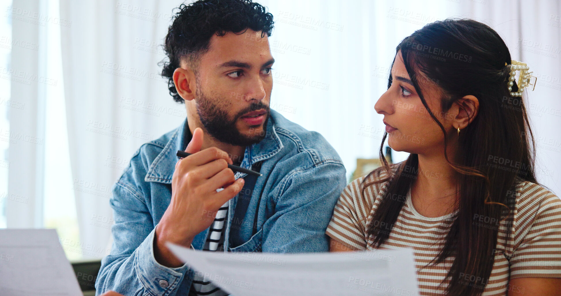 Buy stock photo Documents, talking and couple on sofa in home for bills, payment receipts and banking. Marriage, relationship and man and woman with paperwork for financial planning with taxes, insurance and budget