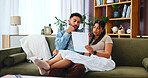 Couple, document and financial discussion in home, mortgage expenses or insurance application. Living room, man and woman with paper for budget planning, taxes or bills for asset management with debt